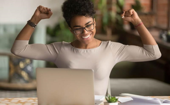 Engaged employee celebrating success at work
